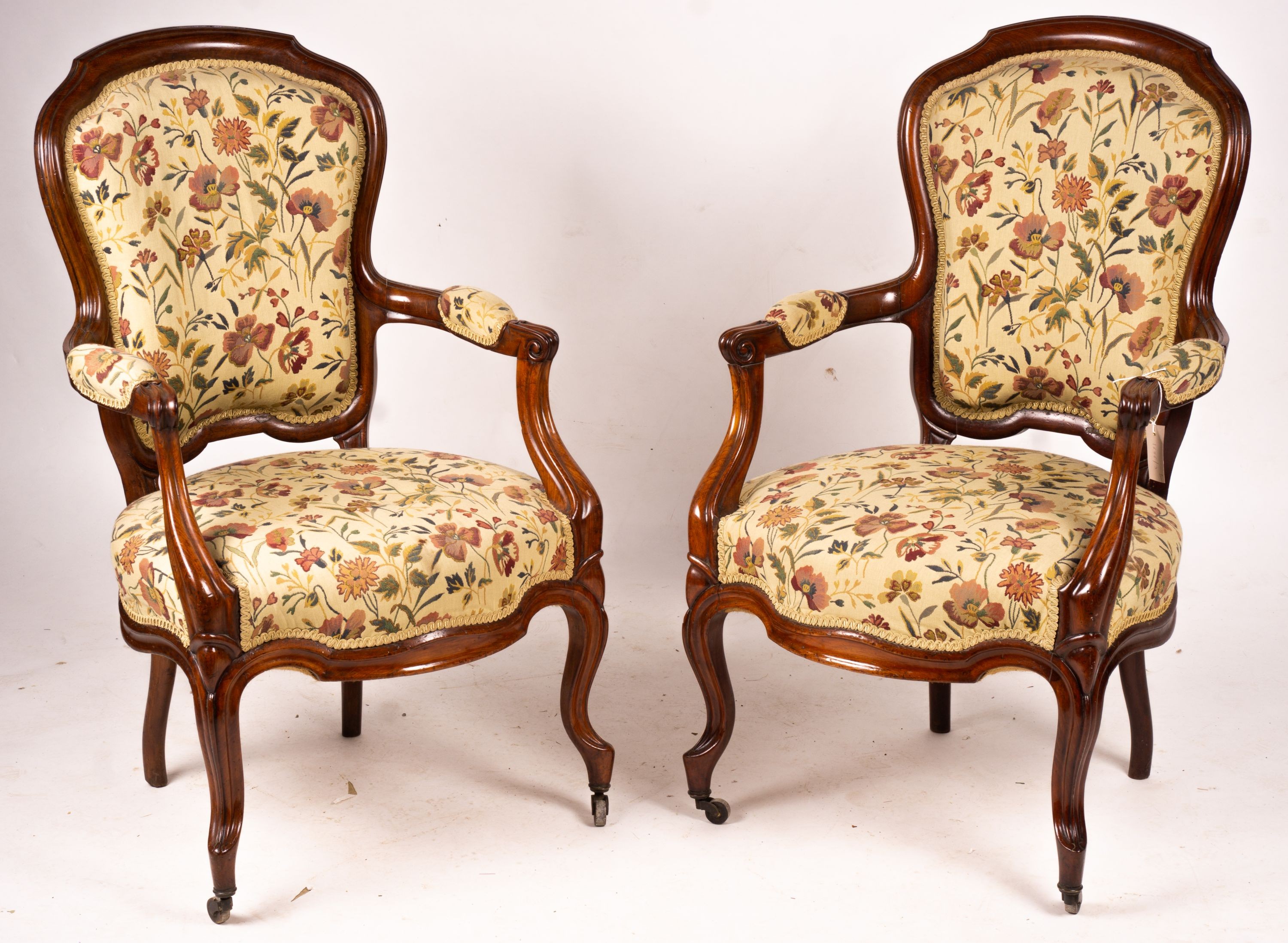 A pair of French mahogany framed open armchairs, width 60cm, depth 50cm, height 100cm